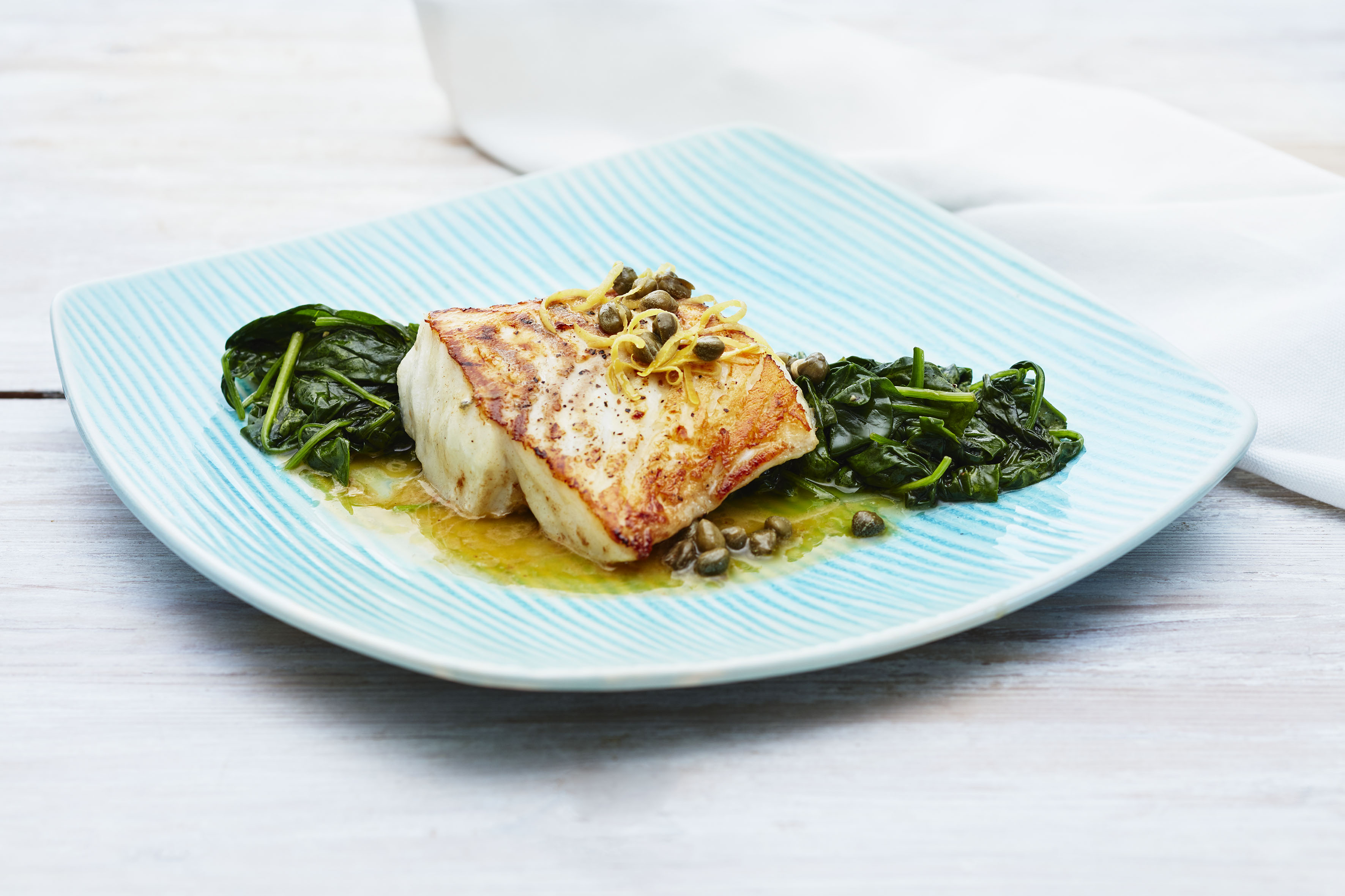 Torskeloin med spinat og kaperssmør